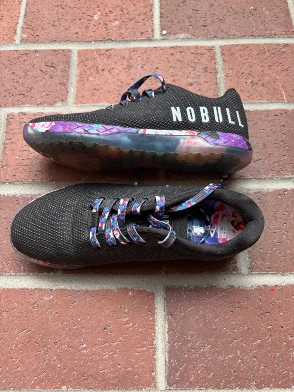 NOBULL Black Training Shoes with Iridescent Purple Floral Details